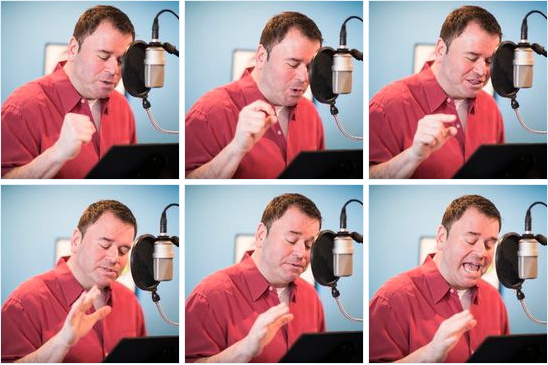 Photo of Harry Legg at the mic in his studio